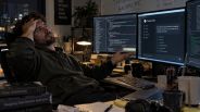 Claude Code developer reviewing AI-generated software at work