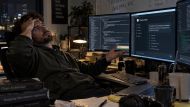 Claude Code developer reviewing AI-generated software at work