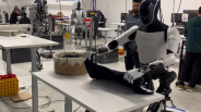Tesla Optimus humanoid robot displayed during technology exhibition