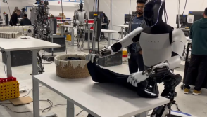 Tesla Optimus humanoid robot displayed during technology exhibition