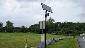 Photo of a double Flock Safety camera installed along County