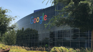 Google logo on a glass-fronted building